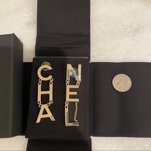 Authentic Chanel letter earrings